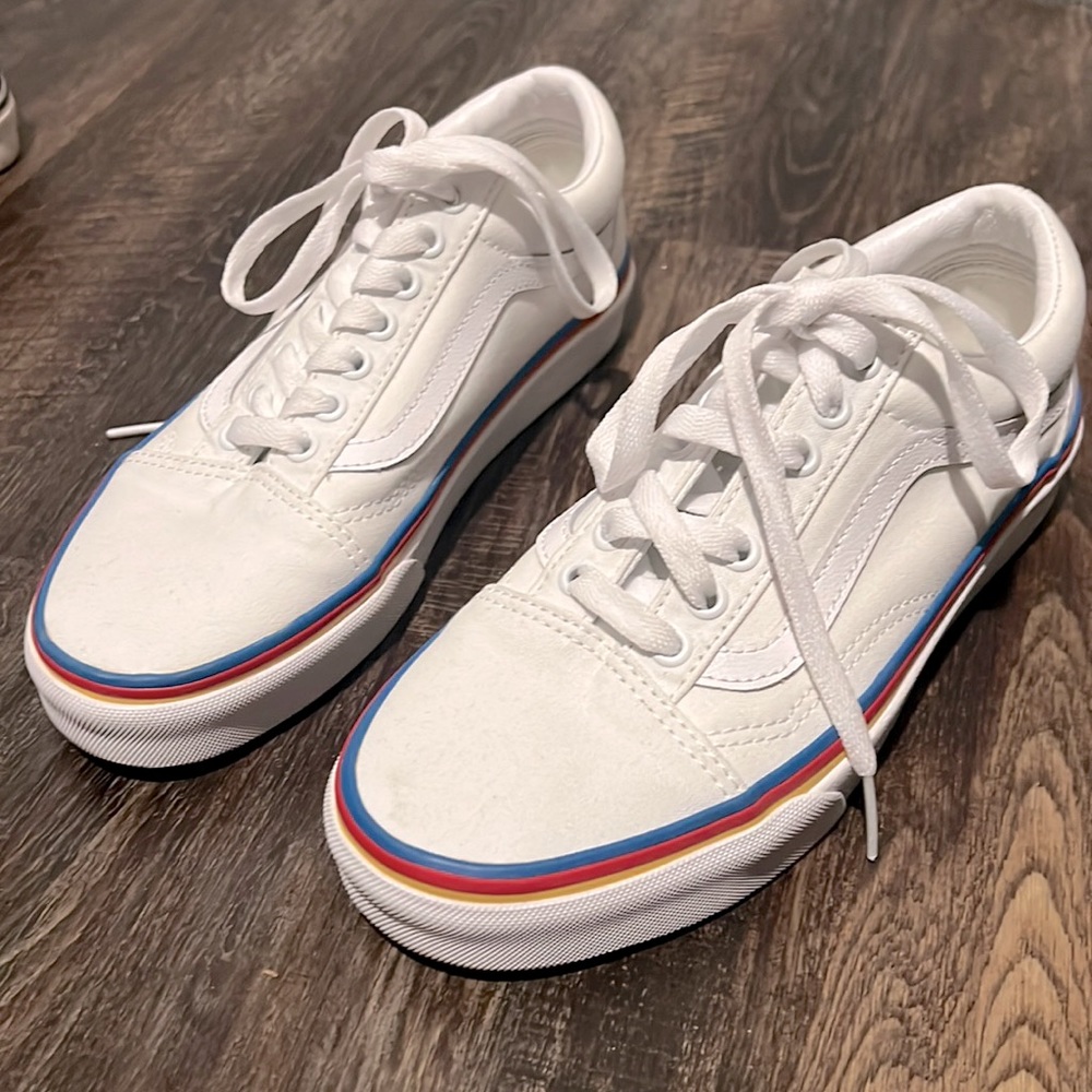 Like brand new vans with blue yellow red stripe